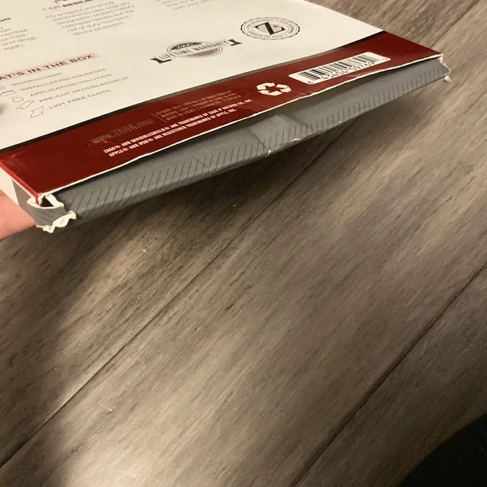 Zagg invisible shield smudge proof screen-cut to size for multiple phone uses